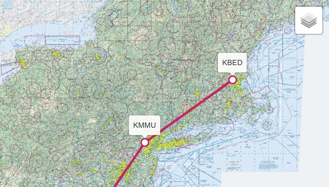 Sectional chart with a planned route between two airports